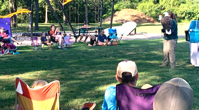 CLEARWATER, BECKER, AND BIG LAKE LIBRARIES all had large crowds attend the Raptor Center presentation. (Photo by Penny Leuthard.)