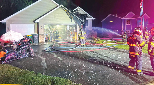A HOUSEFIRE ON MEADOW AVE. gave the Big Lake Firefighting crews plenty to handle in Monday’s busy night and morning. (Submitted Photo).