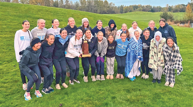 The Becker girls cross country team is shown above holding the conference champions trophy. (Submitted Photo).