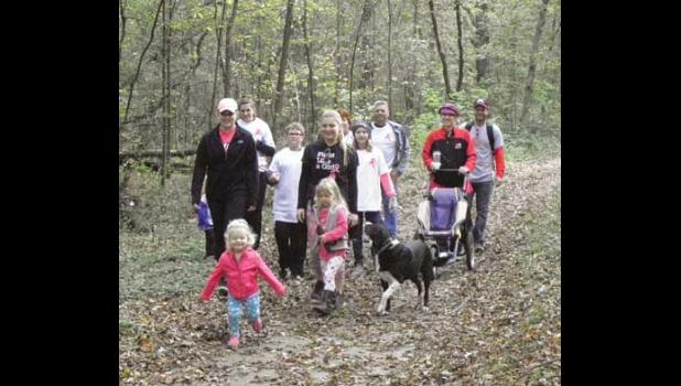 WALKING FOR A CURE. Team RTS from Becker won the prize for the most members (47) at the Walk for Hope at Warner Lake Park last Saturday. Money raised at the event went to the St. Cloud Hospital Breast Center.
