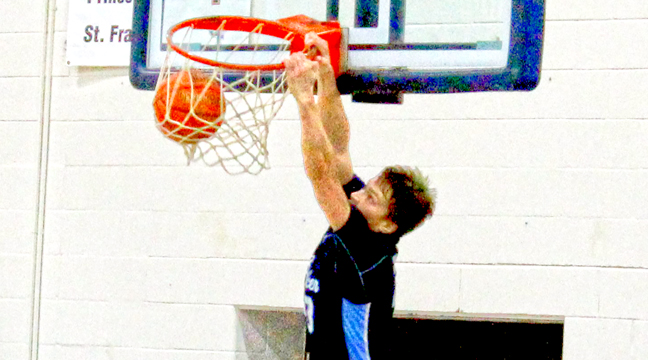 GRAND MARSHAL ELAINE PAUMEN (above left) waves to the crowd during Clearwater’s Heritage Days parade last Friday. 