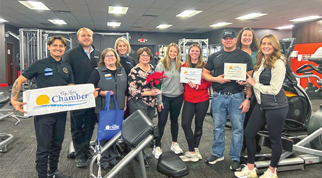 OWNERS, INVITED GUESTS AND MEMBERS of the Big Lake Chamber of Commerce posed for a photo at the recent Grand Re-Opening of the Snap Fitness business in Big Lake. (Submitted Photo).