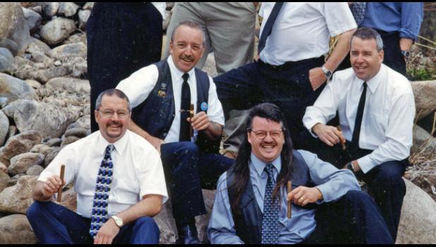 CHUCK MAURER, far right, seated, posed with his six other brothers and father for this family portrait several years ago. (Submitted Photo).