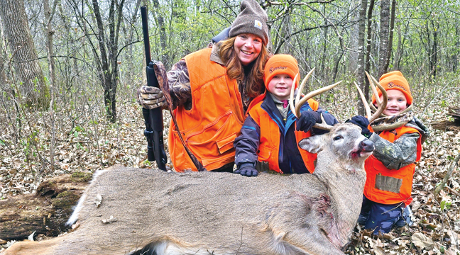 Becker resident Ann Gilbert had help from her grandkids - Jack and Hank - who helped her track this beauty that she harvested on opening weekend (Submitted Photo).
