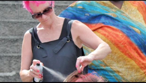 LEE FREDRICKSON gave Avery Rambow a new hairstyle and hair color.