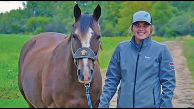 OUTSIDE OF FOOTBALL AND SOCCER, Domka enjoys horseback riding with her quarter horse, Misty. (Submitted Photo)