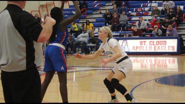 ADELINE KENT defending. (Photos by Mark Kolbinger).
