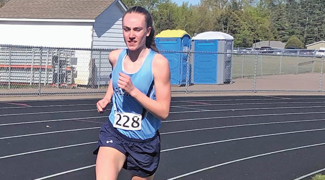 LEXI ROSE kicks into high gear during her run of the 1600M last Tuesday in Princeton.  (Submitted Photo)