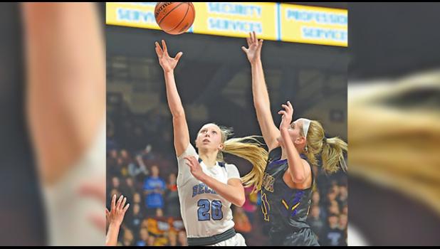 JULIA BENGTSON slashed to the basket during Thursday’s game against Waconia. Bengtson finished with 20 points. (Submitted Photos)