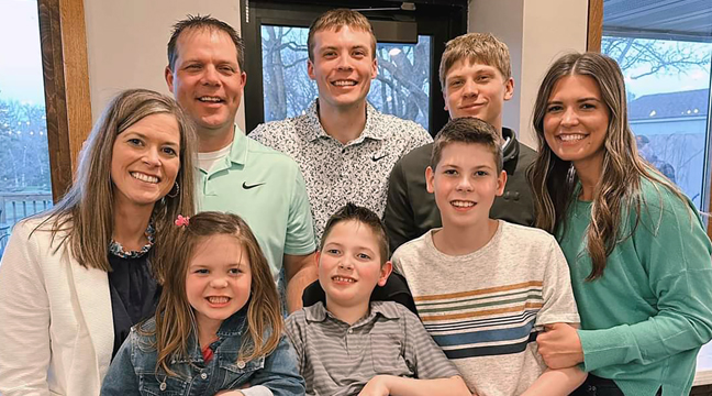 Kristi and Scott Dose (back left) posed with their combined six children at last Friday’s 15th annual Becker Education Association benefit held at Pebble Creek. Kristi has been fighting a years-long battle against cancer, and an estimated 500 people attended the benefit to show support, raising approximately $55,000 total for the family. (Submitted photo.)