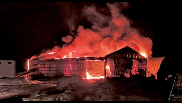 FIRE RAVAGED the Russell Erickson farm in Becker Twp. last April. (Submitted Photo).