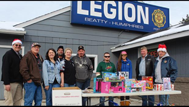 MEMBERS OF THE CLEARWATER LEGION RIDERS, along with other community volunteers, spent the day collecting toys for the Toys for Tots campaign at the Clearwater Legion Saturday. Collections also took place at Clearwater Corners, The Brickyard, the Travel Plaza and Flinstones. (Photo by Ken Francis.)