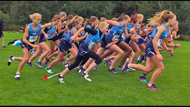 BECKER BULLDOGS take off with the pack at the start of the varsity girls cross country race at St. Francis last week. (Submitted Photo)