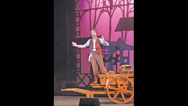 NATHANIEL HED sings If I Were a Rich Man while playing Tevye during Becker High School’s rendition of Fiddler on the Roof. (Photo by Penny Leuthard)