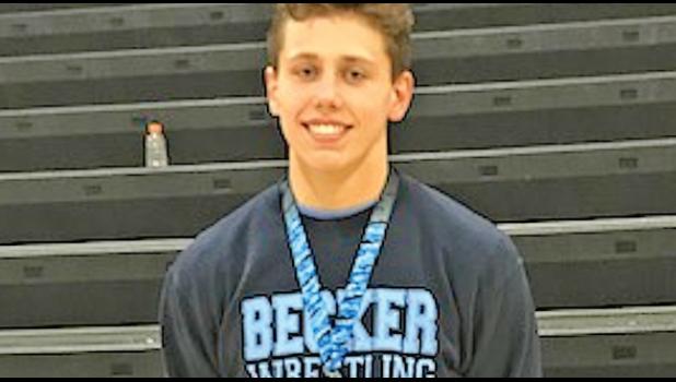 BULLDOG CADEN DEWALL (170) earned the championship in his division at the Rogers “Matness” tournament last week. (Submitted Photo)