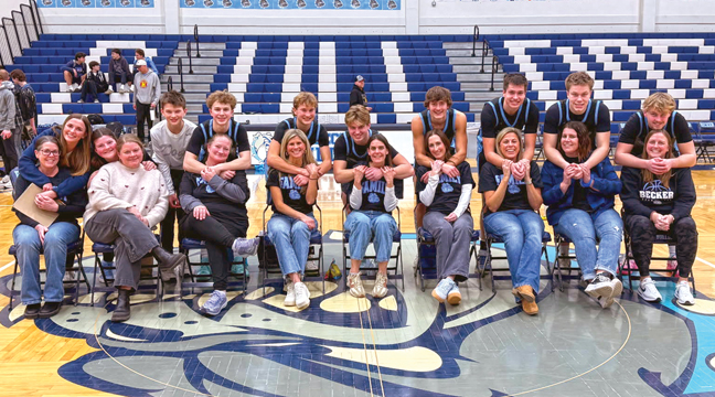 The Becker Bulldog boys basketball team celebrated Senior Night last week, as their moms stormed the court for a fun photo (submitted photo). 