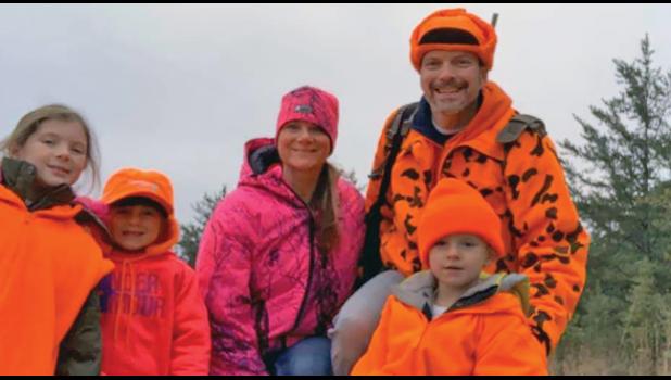 FAMILY ACTIVITY. Violet, Lillian and Crosby Wandersee enjoyed their first time out hunting with their parents, Jim and Megan Wandersee last weekend near Menagha, MN. Jim has been hunting since the age of 12 and wanted to share the experience with his family. The Wandersee family lives near Clear Lake. (Submitted photo). 