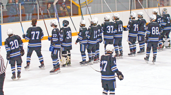 THE BECKER/BIG LAKE EAGLES HOCKEY TEAM saluted the crowd after beating Bagley/Fosston last weekend. (Submitted Photo).