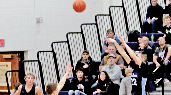 RAINING THREES. The Becker Bulldogs used some sharp shooting to pick up a pair of wins in the past week.  Eric Seavert (top photo) and Hayden Harmoning (bottom photo) are pictured here launching three point shots against the WIllmar Cardinals. (Submitted photos.)