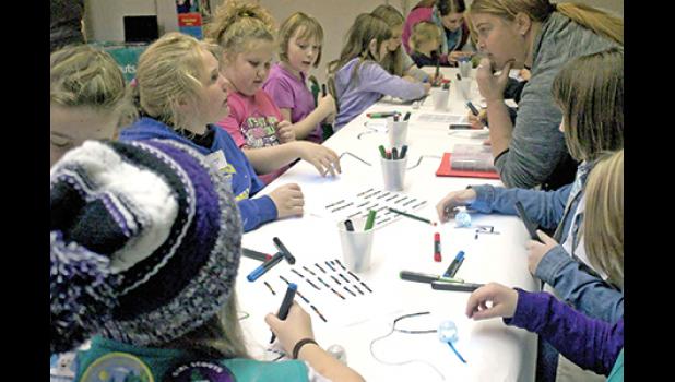 GIRLS CREATE paths for their robot at the Miss Robotics event last Friday (Photos by Susana Kuehne)