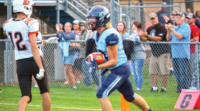 BECKER WR LANDEN GOEBEL began to celebrate after scoring Becker’s first touchdown of last Friday’s game against Delano. Goebel was named player of the game. (Photo by Sara Waytashek)