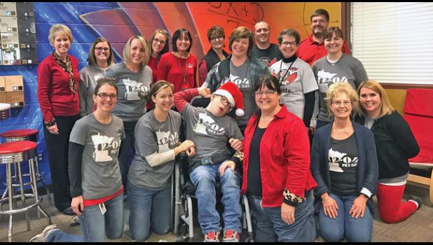 SUPPORTERS OF PKS DAY gathered around Andrew Schmidt (front, middle) at last year’s PKS event in BIg Lake. 