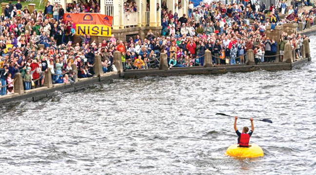 A huge crowd cheered Noah Friedman on at the Stillwater Harvest Festival after he won the race. (Submitted Photo).