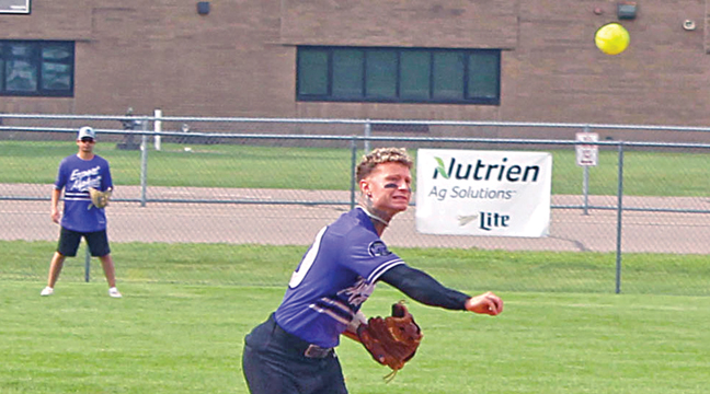 Austin Nichols fires a throw from shortstop for Expert Asphalt. (Photo by Ken Francis)