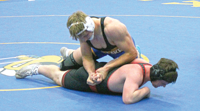 Liam Mayer has complete control of his opponent from North Branch during a dual meet last week. Mayer finished third at 189 pounds at the Big Lake Invitaitional last Friday. (Photo by Ken Francis.)