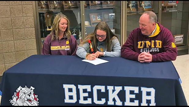 Congratulations to Corrie Weise (M) and her parents Todd and Chris on her signing a letter of committment to continue her academic and athletic career at the University of Minnesota Duluth. (Submitted Photos).