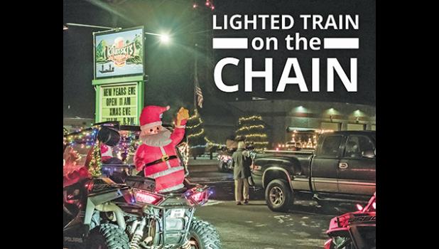 THE LIGHTED TRAIN ON THE CHAIN holiday parade in Palmer Twp. was attended well and featured 17+ vehicles decorated and lit up. The event started at Palmer Park and concluded at Kinitski’s (above). (Submitted Photo).