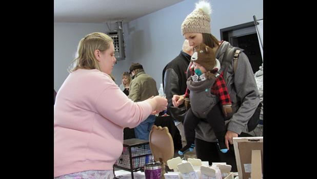 VINCENT EID TAGGED ALONG to the third annual fall craft and vendor event in Clearwater with his mom, Jean. (Photo by Penny Leuthard)