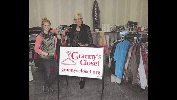 Marla Briggs (left) and Julie Mayo at the new Sherburne County Granny's Closet in Elk River. (Photo by Ken Francis).