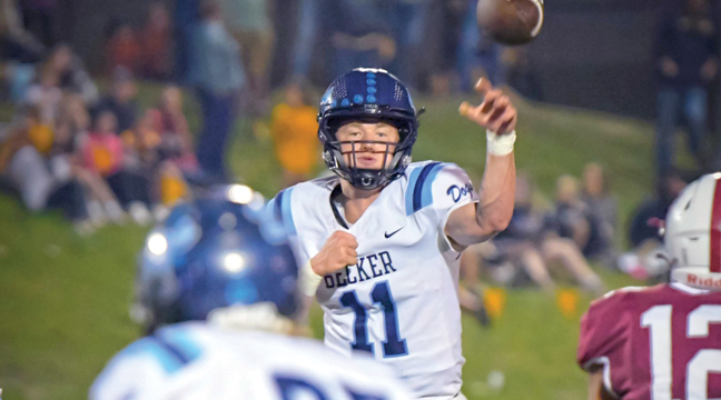 BECKER QB Tristan Kowalkowski unleashes this throw to WR Tarver Schendzielosduring last Friday’s game at Fergus Falls. (Submitted Photo by Anne Koste).