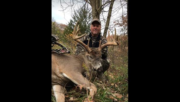 DEER CAMP. Avid hunter Dennis Pederson, of Becker, bagged this 10 point, 200+ pound buck with his bow recently in Iowa. (Submitted photo). 