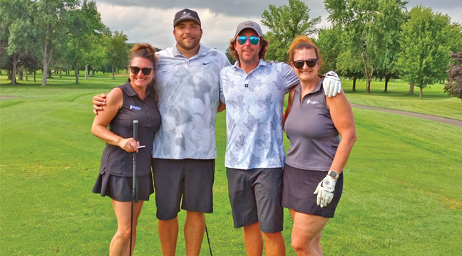 THE SHERBURNE STATE BANK TEAM of  Tanya Danielson, Allen Snegosky, Jerred Merchant and Candice Hanson getting ready to tee off to start the tournament. (Submitted Photo).