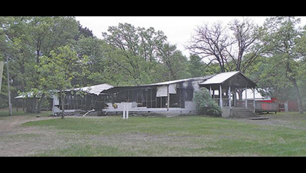 THE MAIN BUILDING for the 4-H Camp near Lake Ann was destroyed by arsonists in May. (Photos by Ken Francis).