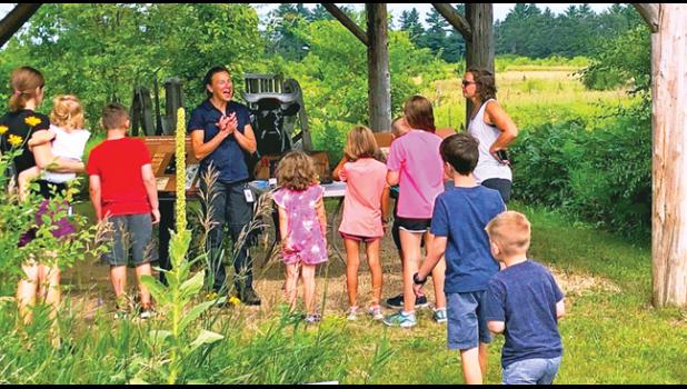 SHERBURNE COUNTY Parks Coordinator Gina Hugo instructed participants on trees at SWCD Discovery Day Aug 2.