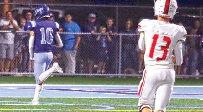 CARTER RECKELBERG (#10) cruised into the end zone for his second TD of the game as the Cardinals got whipped by the Bulldogs, 42-7 last Friday in becker. (Photo by Rebecca Boecker).