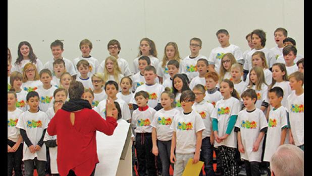 KIDS CHOICE GRADUATES sing the Kid’s Choice Song during their graduation ceremony at Clearview last week. (Photo by Penny Leuthard)