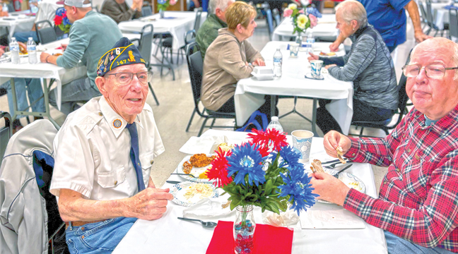 WWII Veteran Bob Blake and his son Robert Jr. enjoyed their time together. (Patriot Photo by Don Bellach)