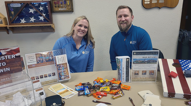 Jenny Massman and Michael Loften, American Heritage Bank. (Photo by Mary Nehring.)
