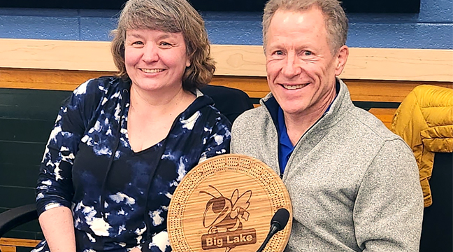 ADAM NYGAARD of Big Lake recently graduated from the Naval Academy. He is pictured here shaking hands with President Joe Biden at his graduation ceremony. (Submitted photo.)