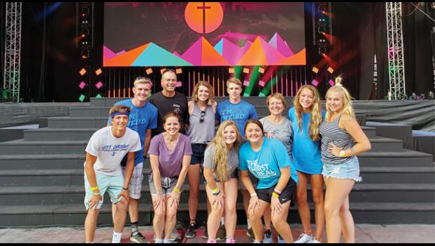 Members of Grace Lutheran  pose for a picture prior to jamming out with 25,000 other Christians at U.S. Bank Stadium.