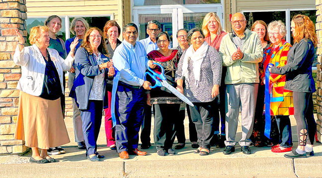 AMERICA’S BEST VALUE INN recently got a new owner, Saghir Abid. The Big Lake Chamber of Commerce celebrated Abid’s joining the community of businesses with a ribbon cutting ceremony.  Pictured (left tor ight) Gloria Vande Brake of Big Lake Chamber, Elisa Berry of Ember Coffee, Brenda Geldert of Options Inc, Sherburne County Commissioner Raeanne Danielowski of JC’s U Lock Storage, Big Lake City Administrator Hanna Klimmek, Americas Best Value Inn Owner Saghir Abid, Zaheer Abid, Naeema Zaheer, Badar Jang, Shaheen Abid, Becky Jacobs of Northstar Technologies, Safdar Jang, Jessica Barthel of Sherburne County, Cindy Lemm of Coldwell Banker, and Lisa Fenton.  (Patriot Photo by Casey Hanson.)