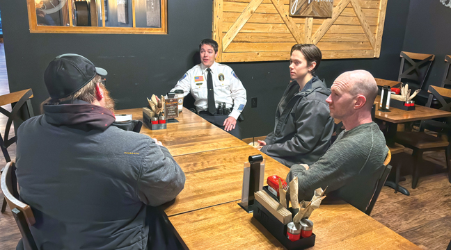 Police Chief Chris Lindbloom connects with Becker residents over coffee last week. (Patriot Photo by Don Bellach)