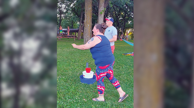 SHANNON REAGAN was enjoying a game of BulzIBucket Game with Paul Knier. 
