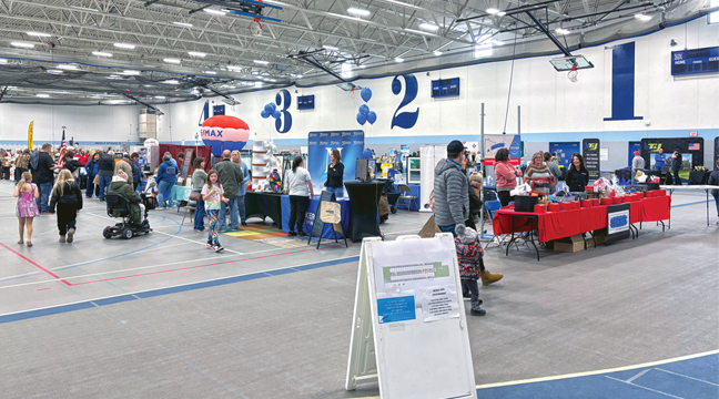 Attendees filled the Becker HS Fieldhouse. (Patriot Photo by Don Bellach)