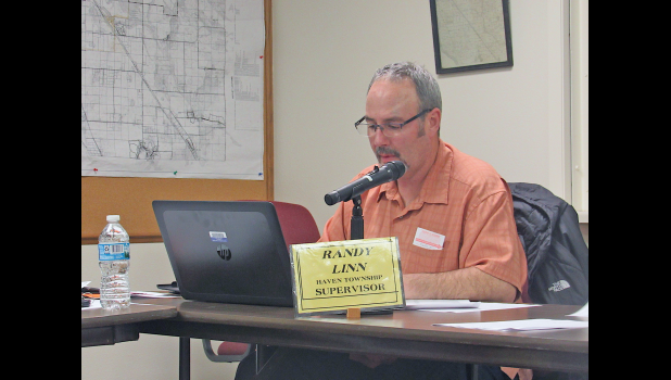 HAVEN TWP. SUPERVISOR RANDY LINN explains the proposed 2020 township budget to the board during their meeting Monday night. (Photo by Penny Leuthard)