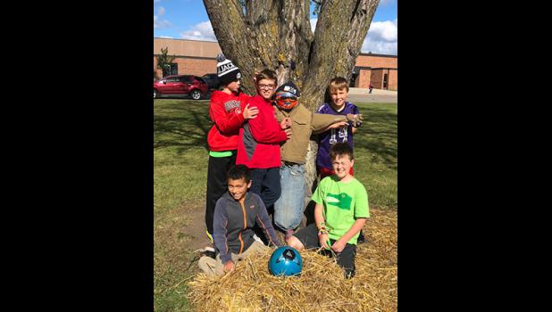 Hanging out with their new straw-filled buddy are Gabe H., Cameron H., John S., Andres S. and Nate G.
